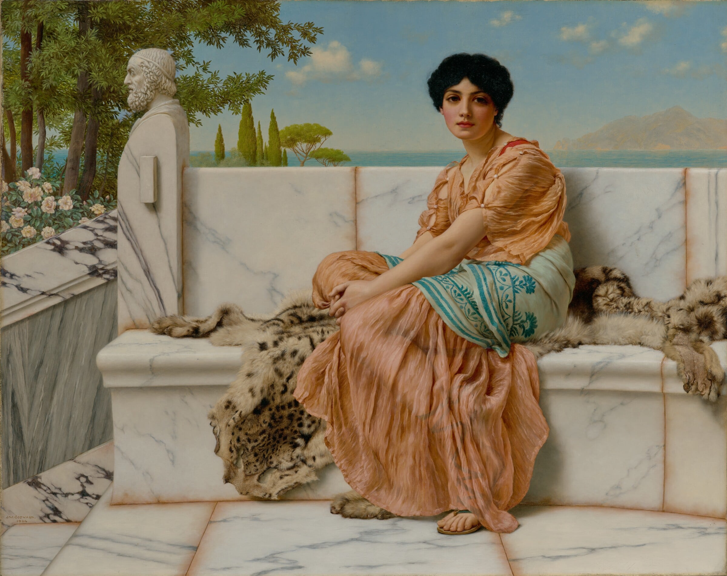 A young woman in a peach-colored robe seated on a marble bench draped with a leopard skin, a bust of a bearded poet beside her, with cypresses, pines and a blue sea behind, in Godward's painting